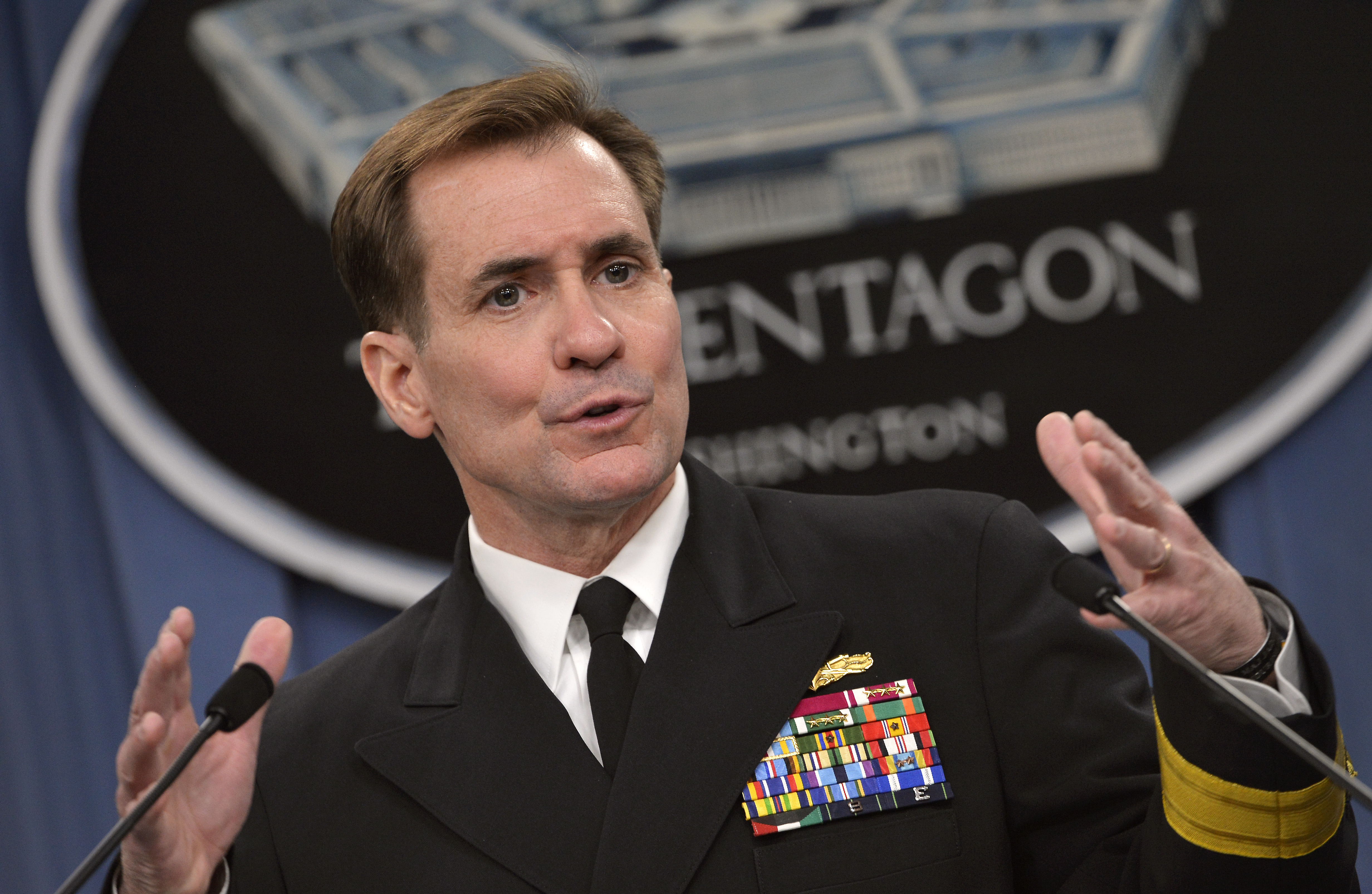 Pentagon Channel as Pentagon Press Secretary Navy Rear Adm. John Kirby briefs reporters in the Pentagon Press Briefing Room March 27, 2014. Kirby outlined objectives of Secretary of Defense Chuck Hagel's trip to Asia next week and as well took questions regarding the ongoing crisis in the Ukraine and search efforts for missing Malaysia Airlines Flight MH370. DoD Photo by Glenn Fawcett (Released)
