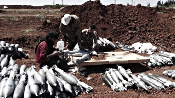 In an undated photo, Ahrar al Sham terrorists prepare rockets for the bombardment of Kafarya and Foua, villages located in Idlib province.