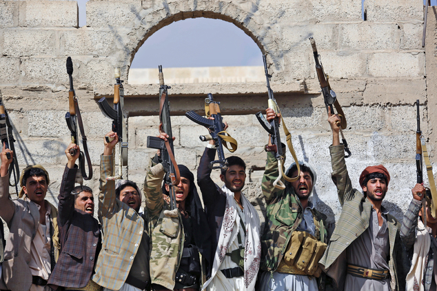 FILE - In this Dec. 15, 2015, file photo, Shiite tribesmen, known as Houthis, hold their weapons as they chant slogans during a tribal gathering showing support for the Houthi movement in Sanaa, Yemen. Saudi Arabia traded 109 Yemeni prisoners taken during its coalition war against Shiite rebels there for nine Saudis, authorities said Monday, March 27, 2016 the latest prisoner exchange ahead of a scheduled April cease-fire and peace talks. (AP Photo/Hani Mohammed, File)