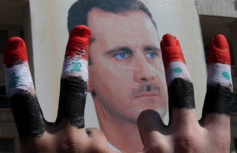 assad-rally-march-2011-fingers