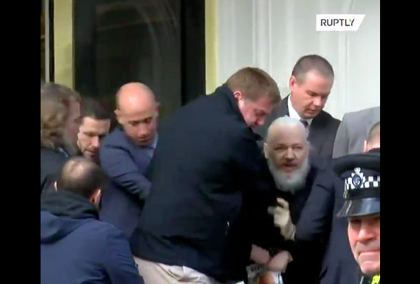 The scene outside the embassy as Assange was dragged into custody.