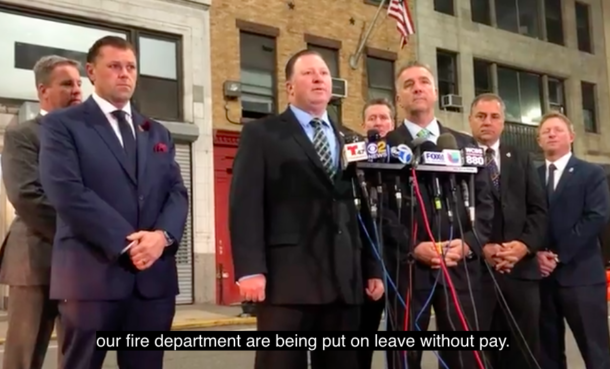 New York Firefighters Union boss Andrew Ansbro speaks to the media.